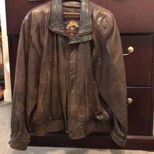 Brown leather bomber jacket with green collar